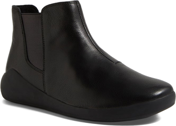 Black leather ankle boot on a white background